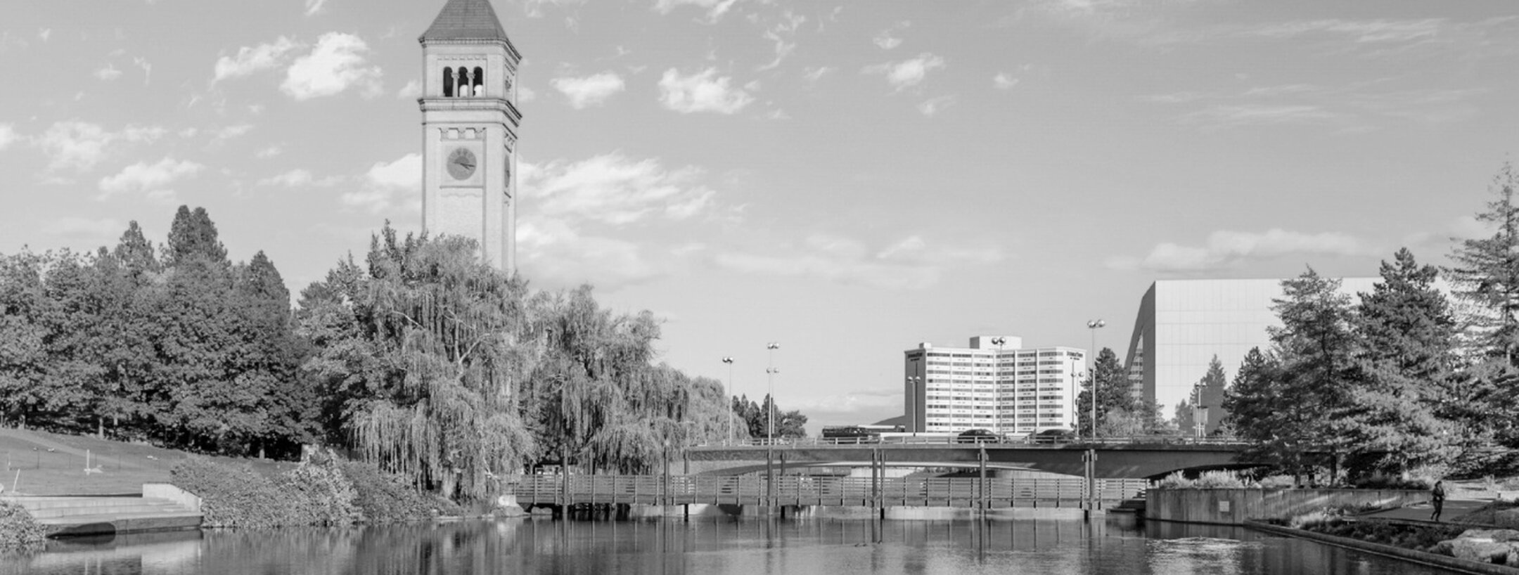 Riverfront Park in Spokane, with the Great Northern clock tower reflected in the river